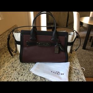 Beautiful Swagger Coach purse. Brand new.